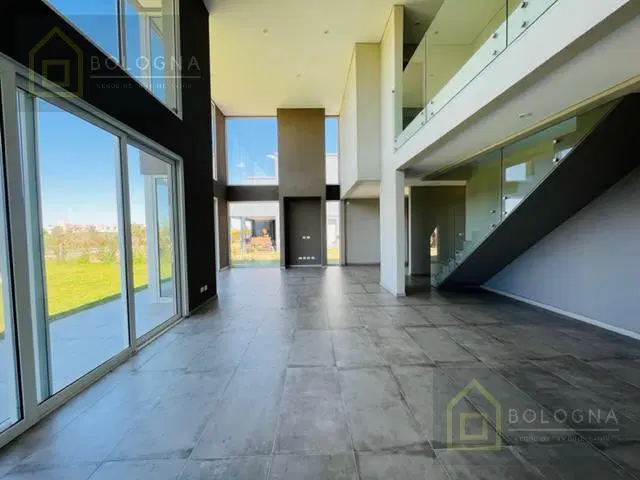 VENTA CASA A ESTRENAR EN MUELLES PUERTOS, 5 AMBIENTES, PISCINA, VISTA AL LAGO 4