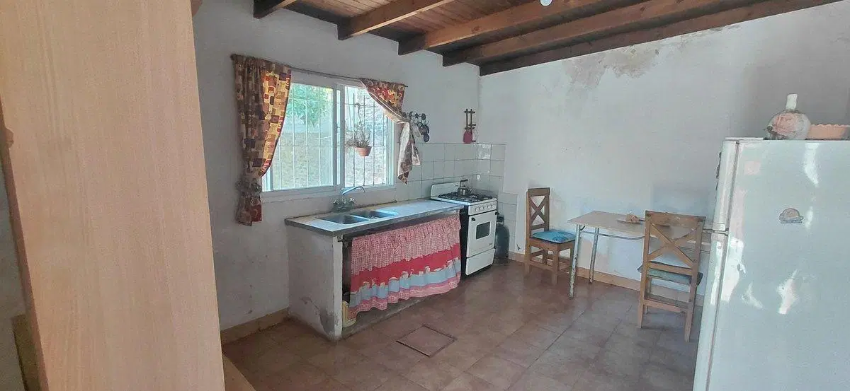 CASA CON FONDO Y LOCAL AL FRENTE GLEW CENTRO 3