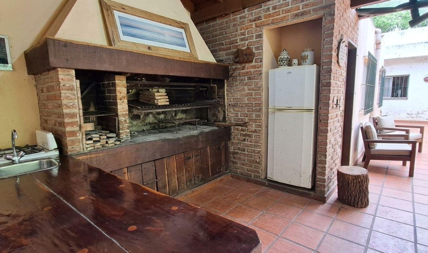 Foto de CASA CON FONDO JARDIN QUINCHO PARRILLA BARRACAS, imagen 2
