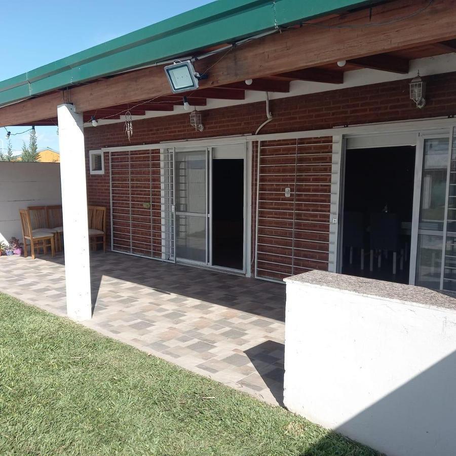 Amplio Terreno con Quincho/casa y Pileta 4