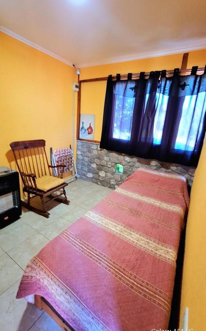 Foto de Villa Giardino Cabaña de Madera y piedra, imagen 2