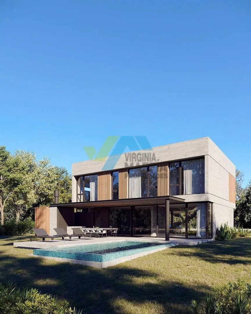 Casa en dos plantas con hormigon visto a la laguna en Riberas Puertos del Lago 4