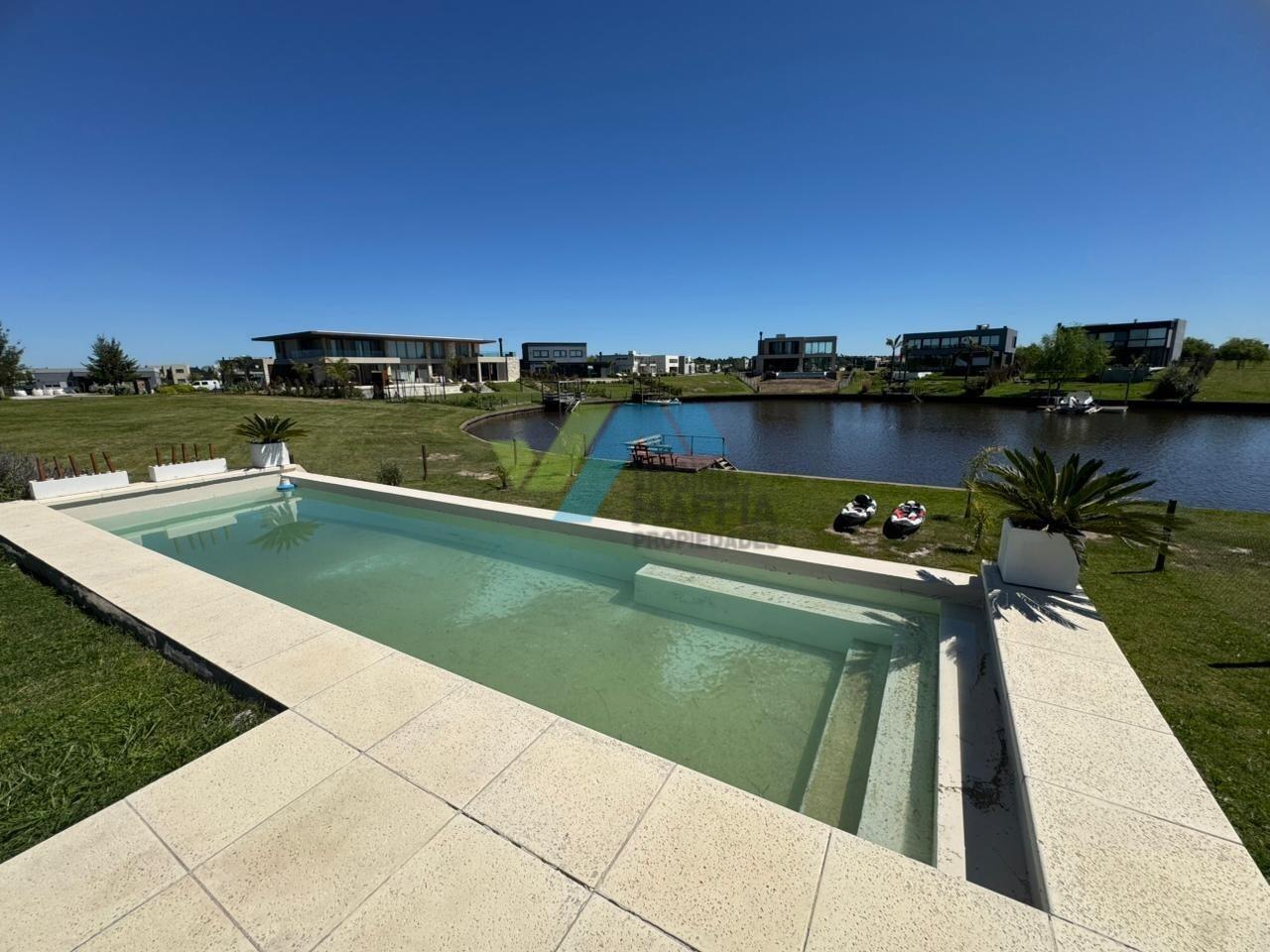 Foto de Moderna casa con pileta al rio - NAUDIR AGUAS PRIVADAS, imagen 1
