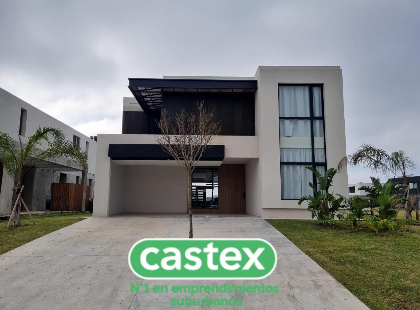 Casa en Alquiler a laguna central de Puertos, barrio Costas