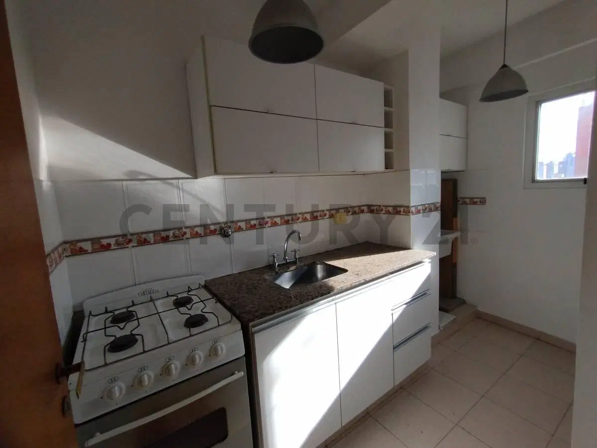 Departamento de 2 dormitorios con cochera en alquiler 3