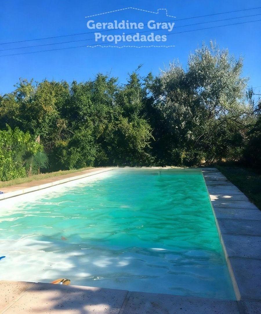Foto de Chacra de 12.545 m2 en venta en Centenario, imagen 1