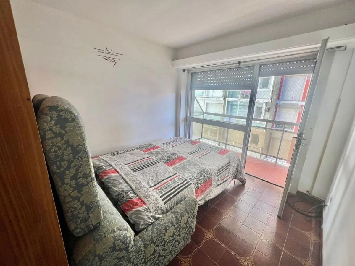 Ambiente al lateral con balcón en ALQUILER ESTUDIANTIL 2