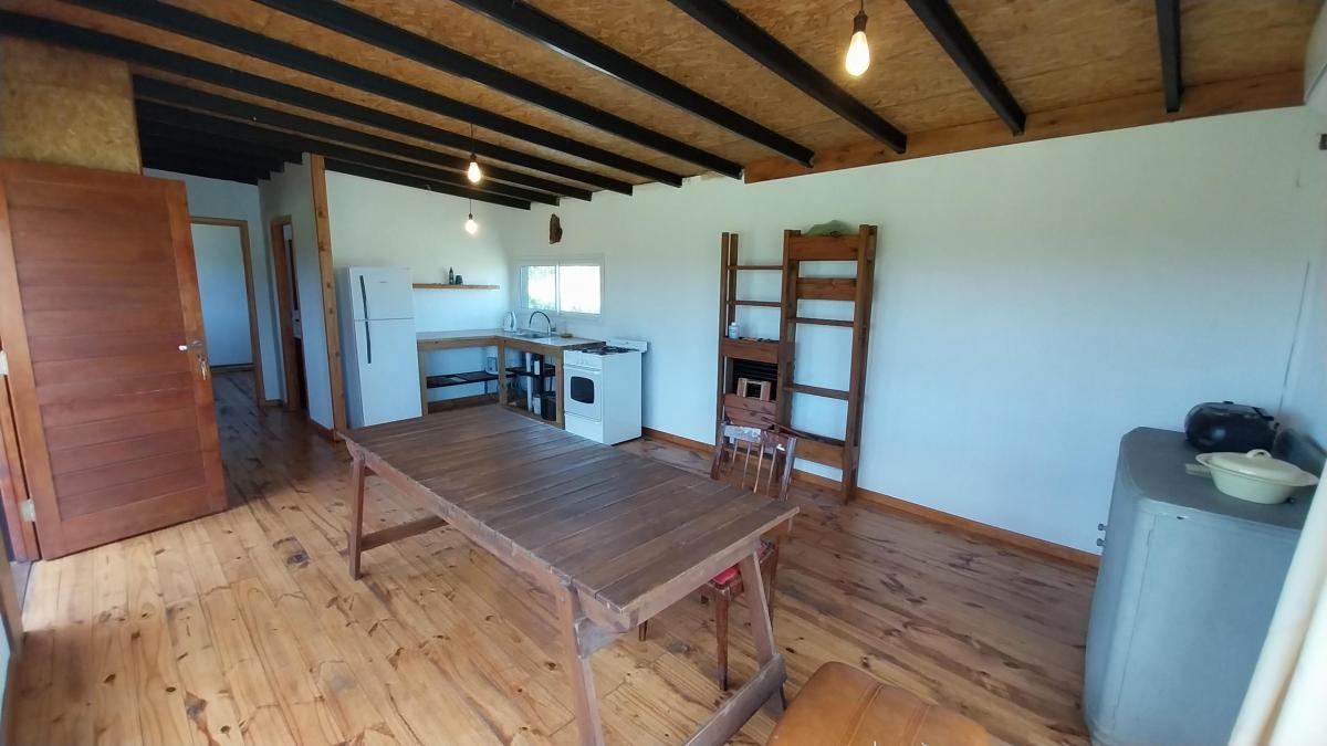 Foto de RETASADA - BAJO SU VALOR!! MODERNA CASA QUINTA EN VENTA EN LA PEREGRINA, imagen 2