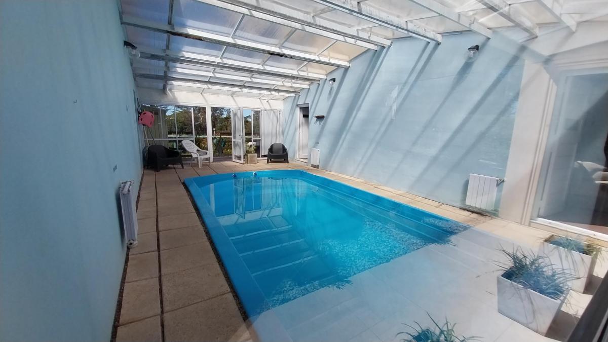 Foto de Dos unidades en venta en Sierra de los Padres. Piscina climatizada y, imagen 3