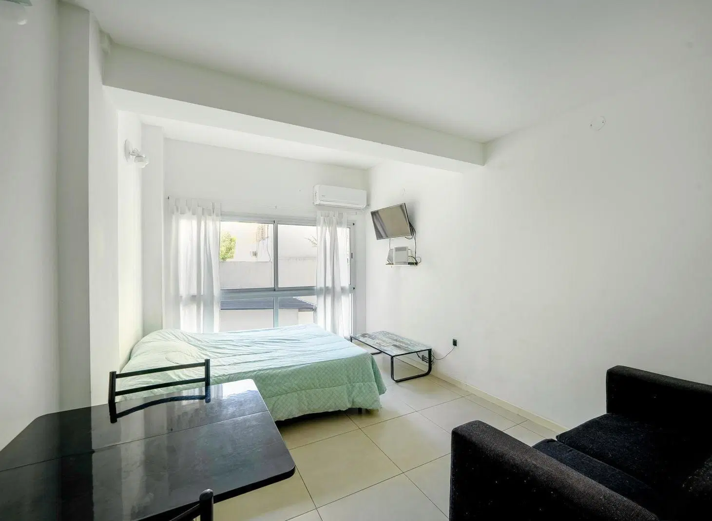 Monoambiente amoblado con amenities en alquiler temporario en Almagro 4