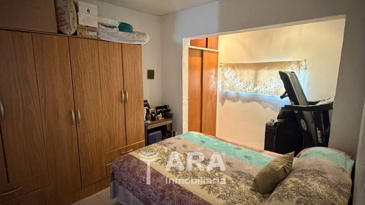 Casa 2 dormitorios + cochera + quincho + avance de ampliación en Cipolletti 5