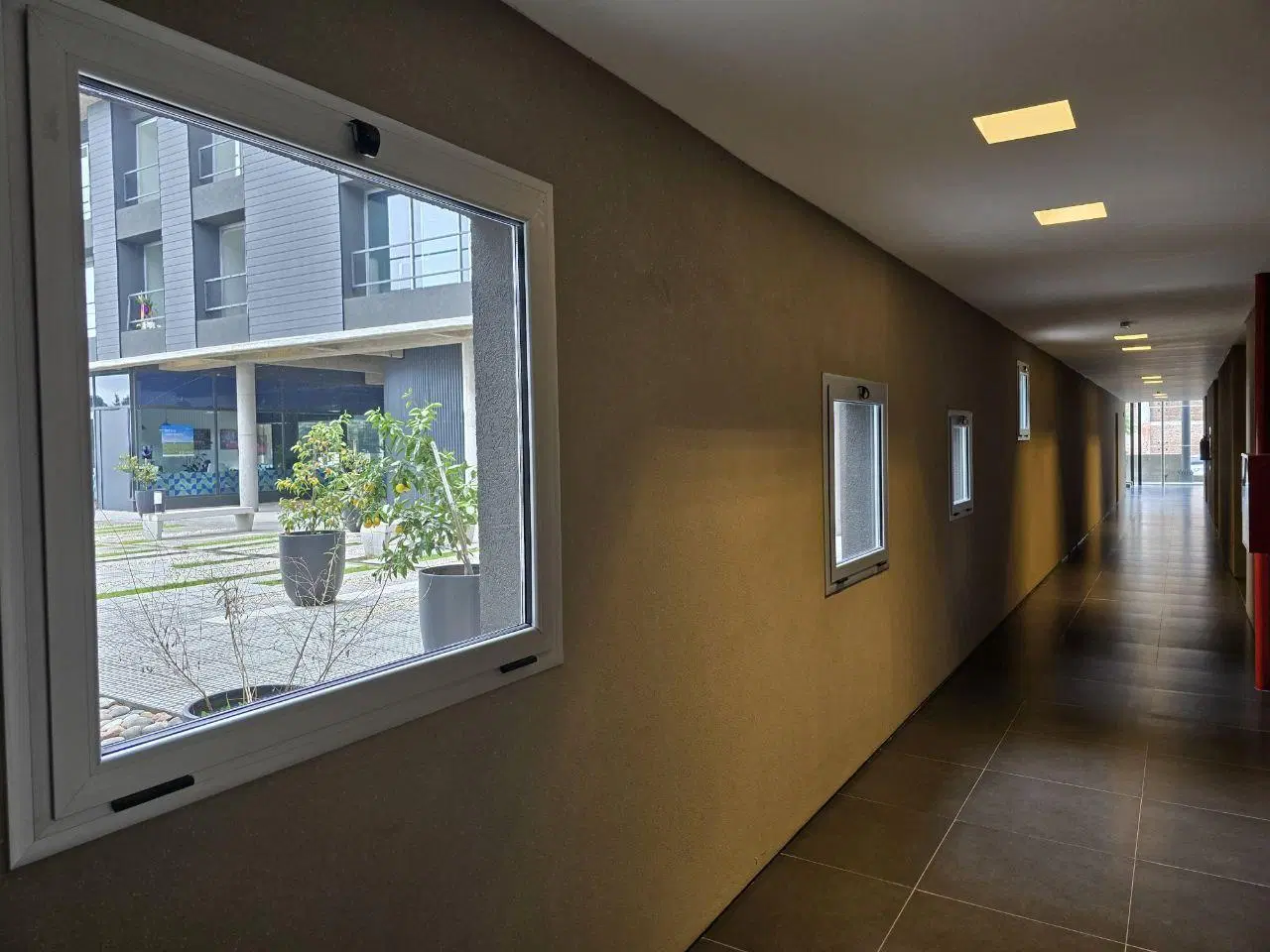 VENTA DEPARTAMENTO CON PATIO 4
