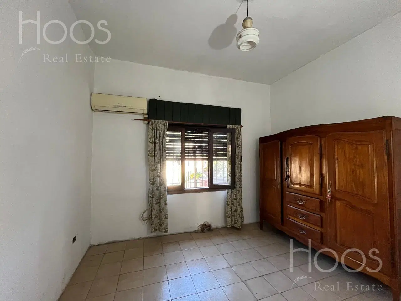 Casa 3 amb. Con patio y cochera en venta - Ituzaingó 5