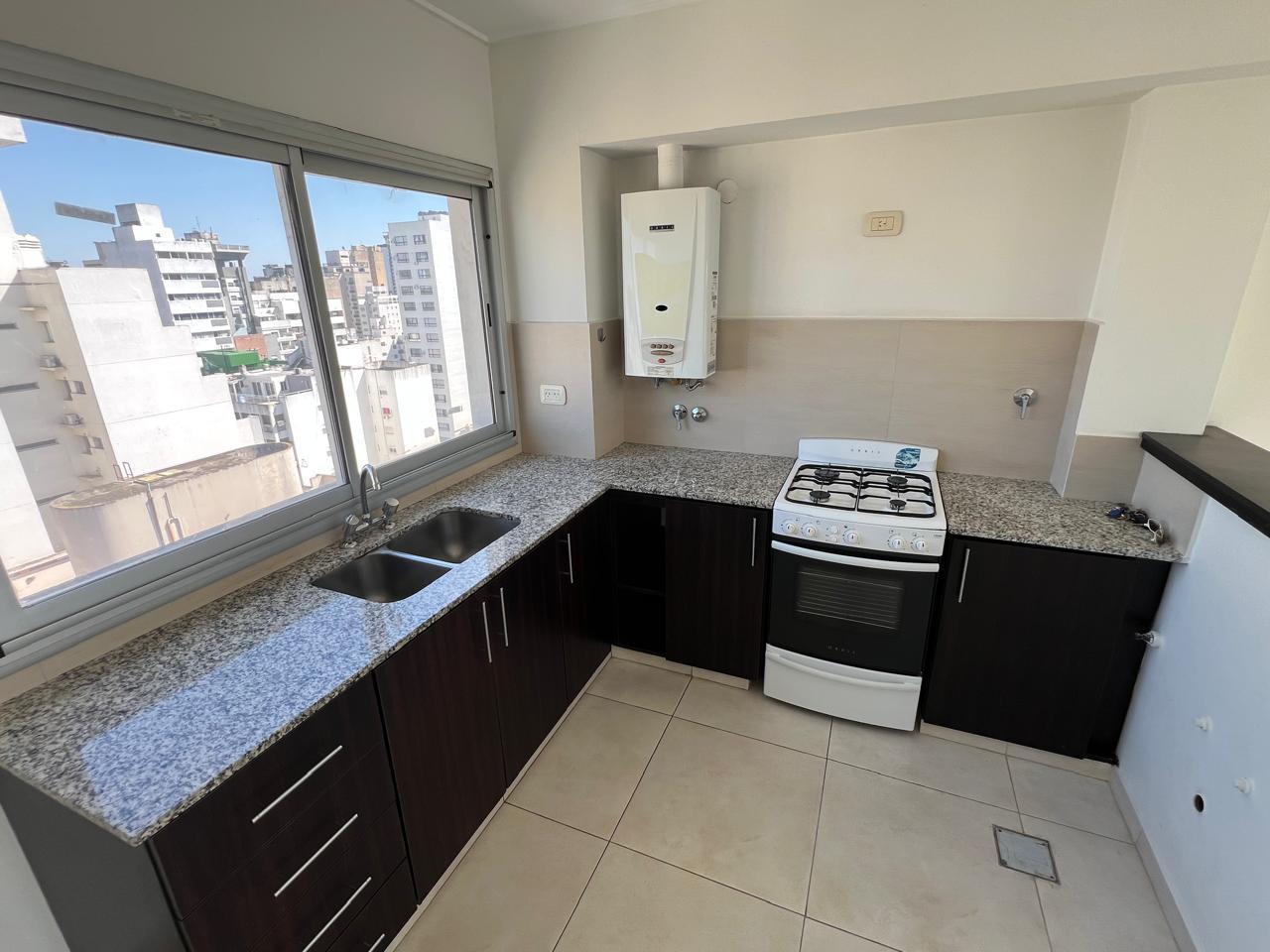 Foto de Departamento de un dormitorio con cochera en venta, imagen 1