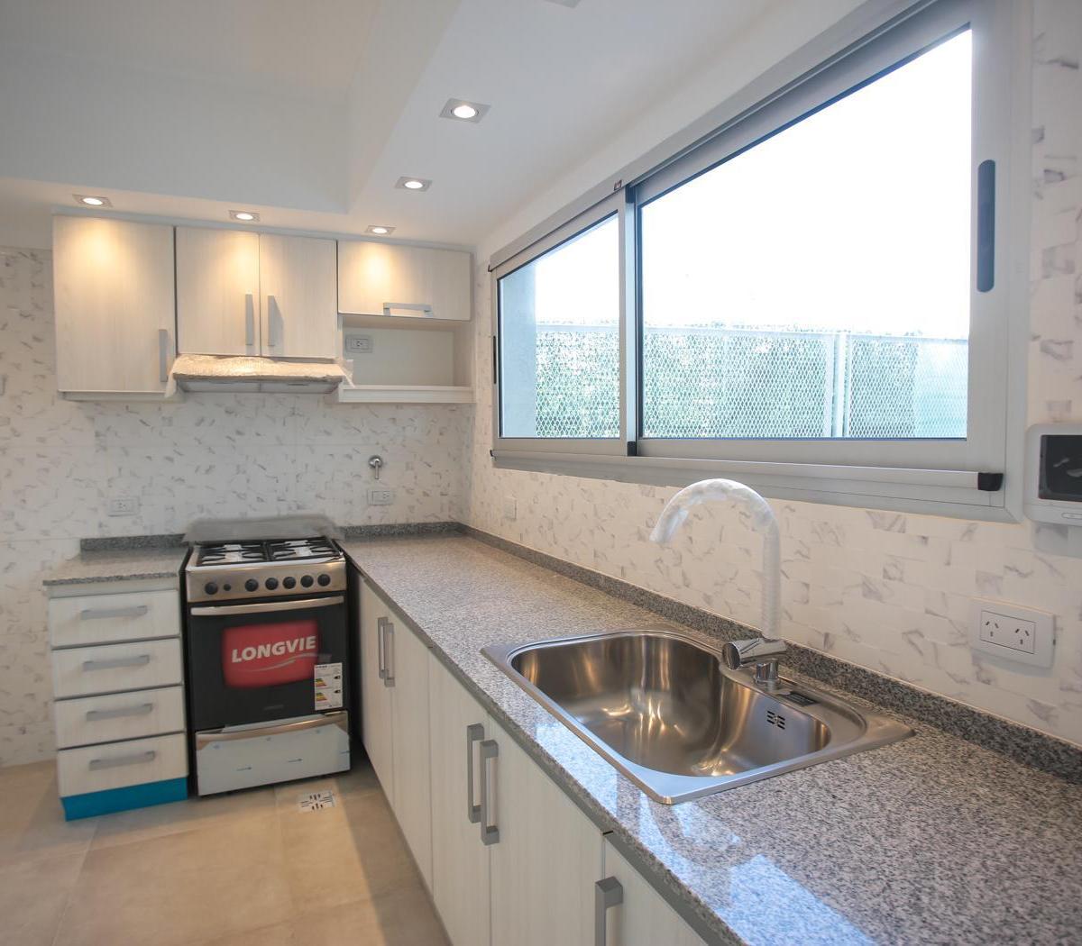 Piso Unico de 3ambientes con Dependencia Quincho Parrilla y Gran Terraza 2