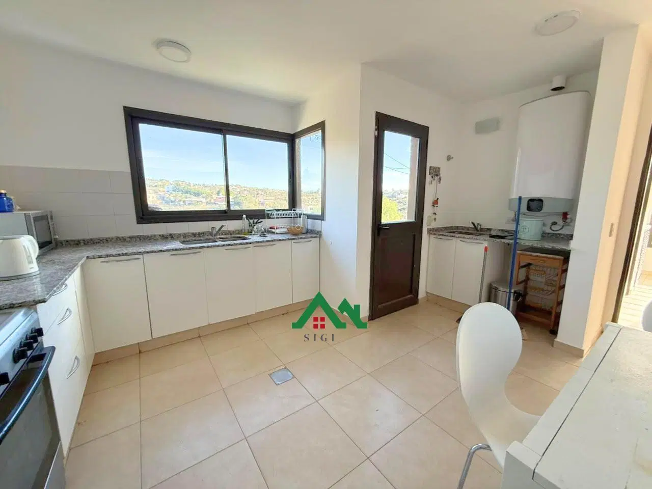 Casa en venta en Villa Carlos Paz, 3 dormitorios, pileta y vista a las sierras 3