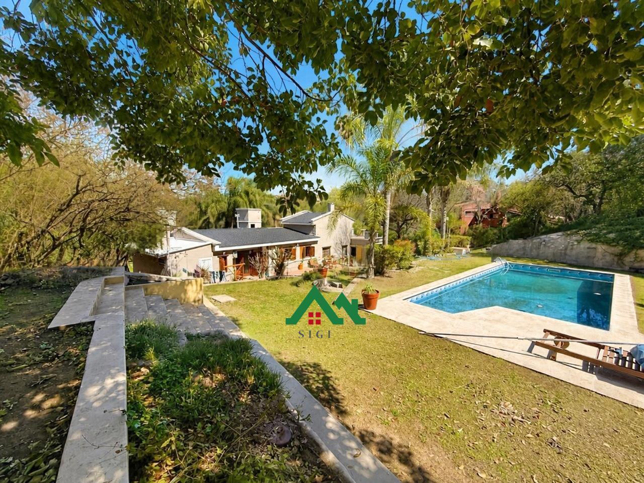 Foto de Casa en venta planta baja con pileta en barrio Valle del Sol Apto, imagen 1