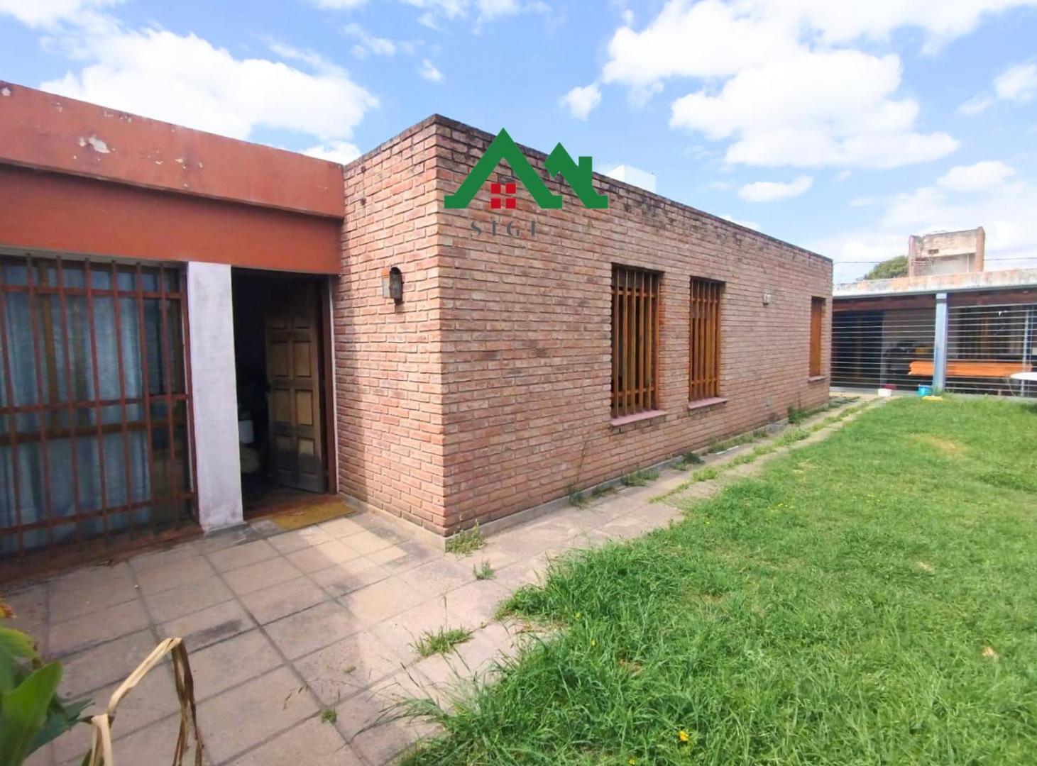 Foto de Casa en venta de 4 dormitorios con patio y asador en Urca, imagen 2