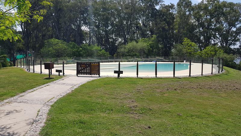 Venta de Terreno en Espectacular Barrio Ribera - Fighiera 1