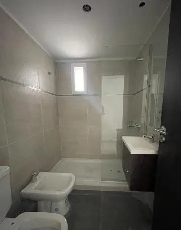Departamento monoambiente con patio en venta Lourdes Rosario 2