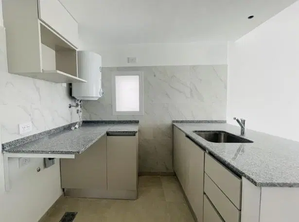 Departamento monoambiente con patio en venta Lourdes Rosario 5