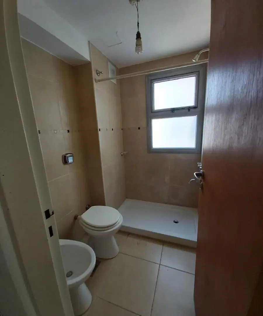 Departamento un dormitorio y cochera en venta Pichincha 3