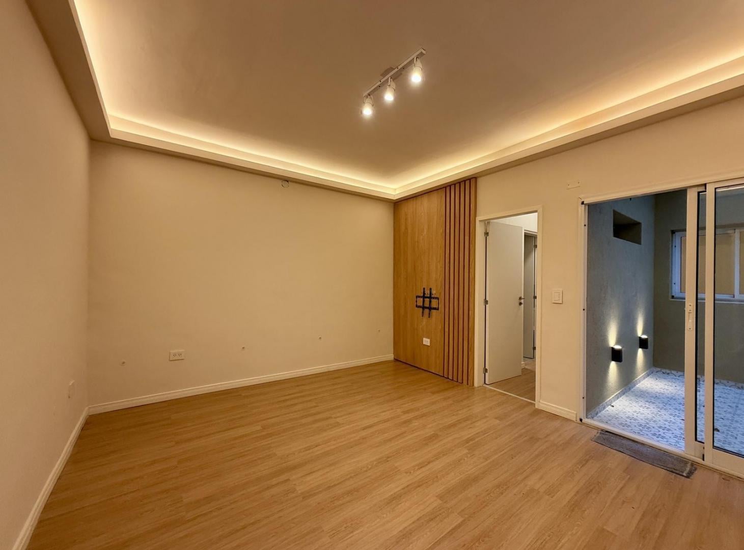 Foto de Departamento 3 DORMITORIOS CON PATIO EN VENTA Martin, imagen 2