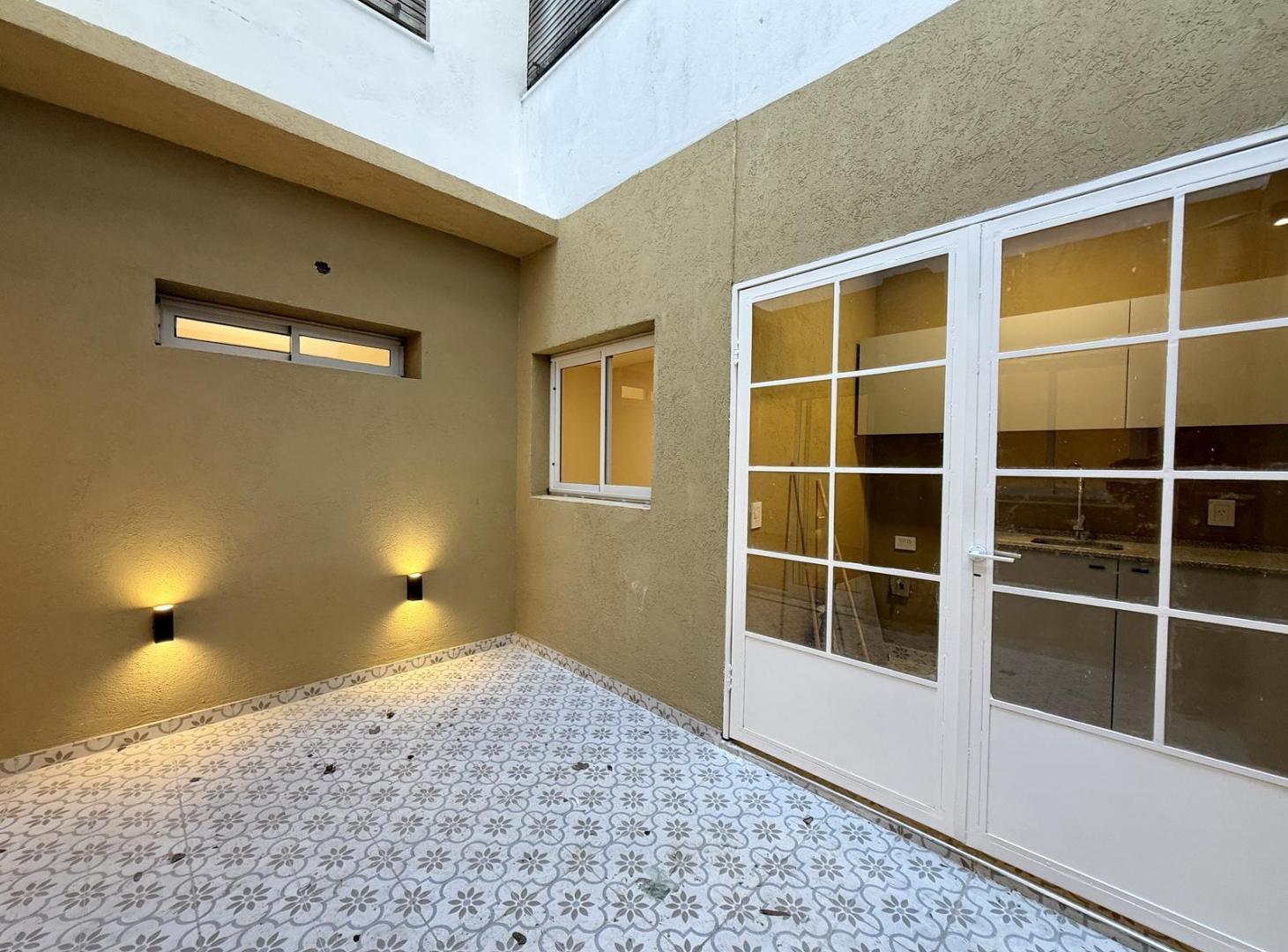 Foto de Departamento 3 DORMITORIOS CON PATIO EN VENTA Martin, imagen 4
