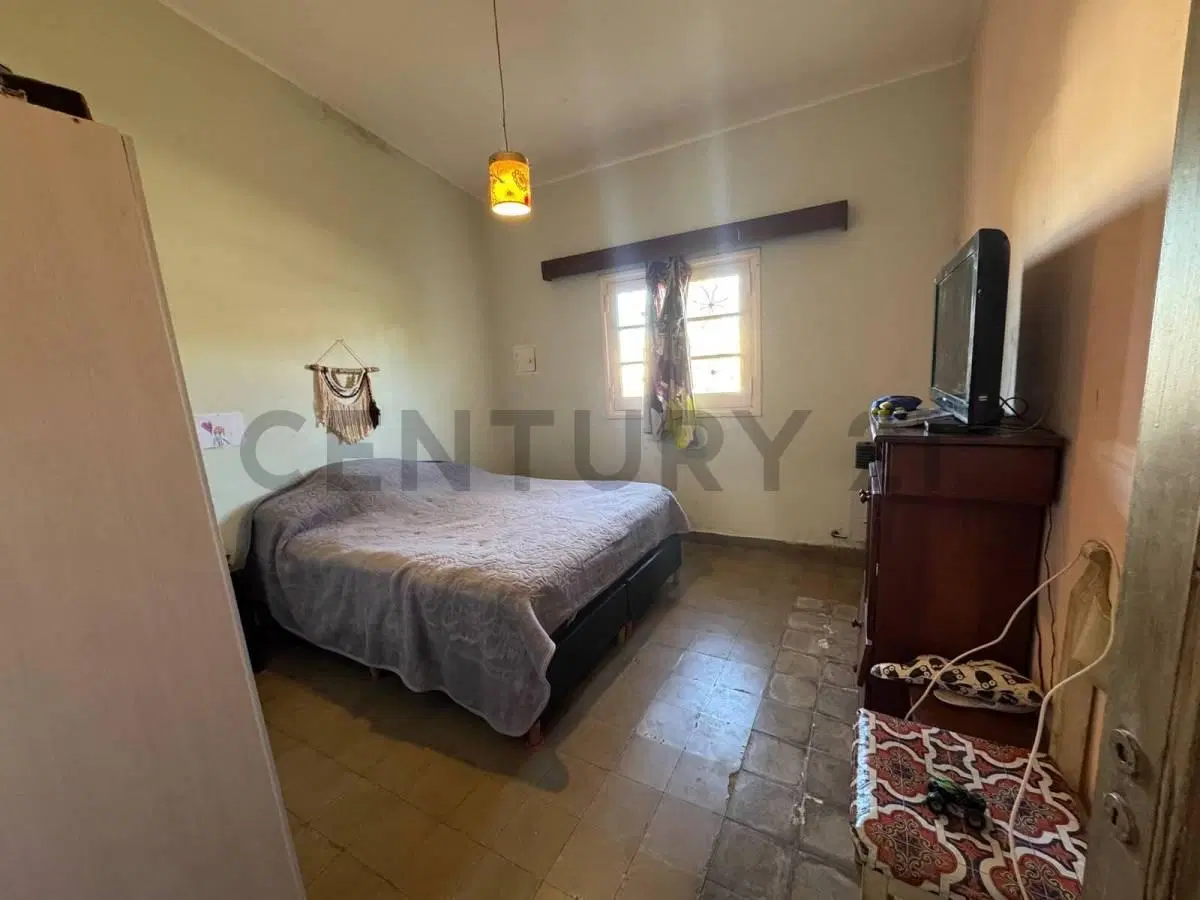Casa de 3 Dormitorios en Barrio Residencial Olivos – Amplio Patio y Terreno de 370 m² 5