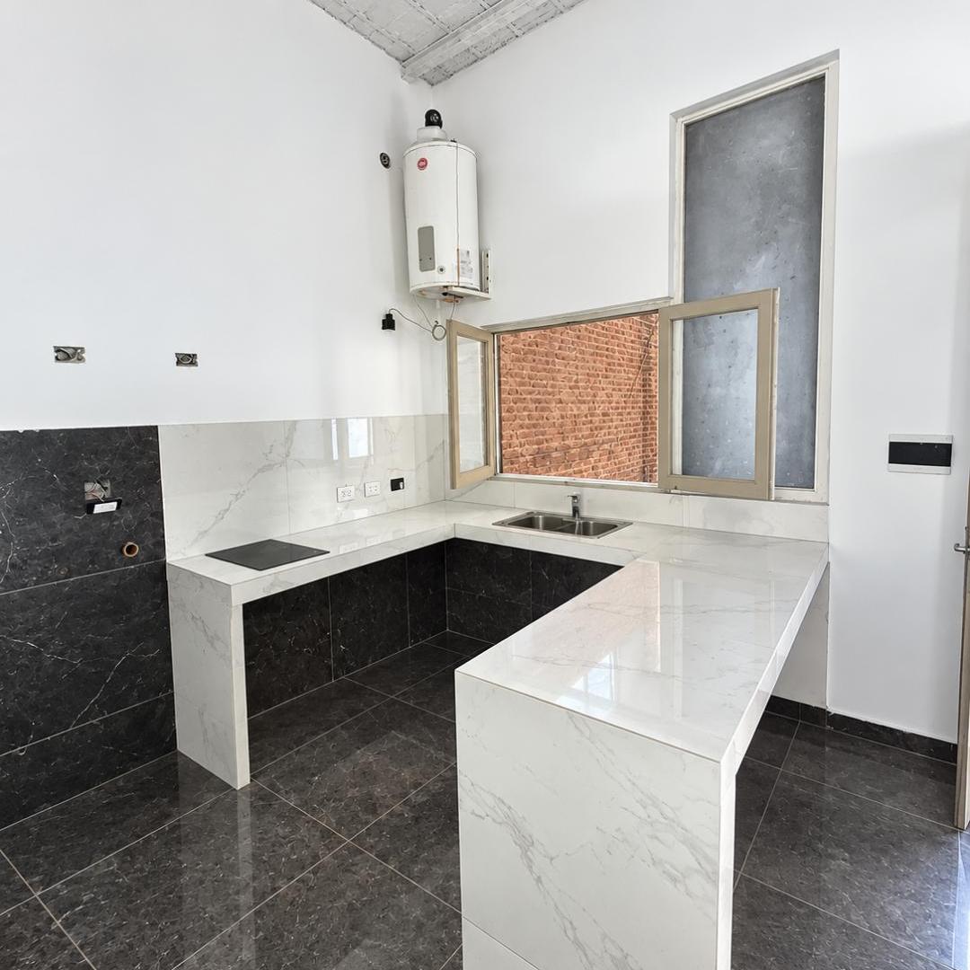 Foto de Departamento de 70 m² con 2 dormitorios en alquiler en Centro, imagen 2