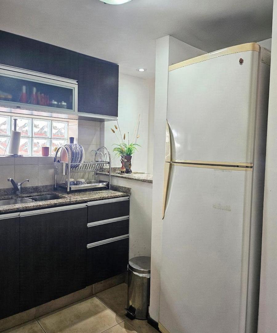 Foto de DEPARTAMENTO EN VENTA DE UN DORMITORIO CON COCHERA, PISCINA Y QUINCHO, imagen 4