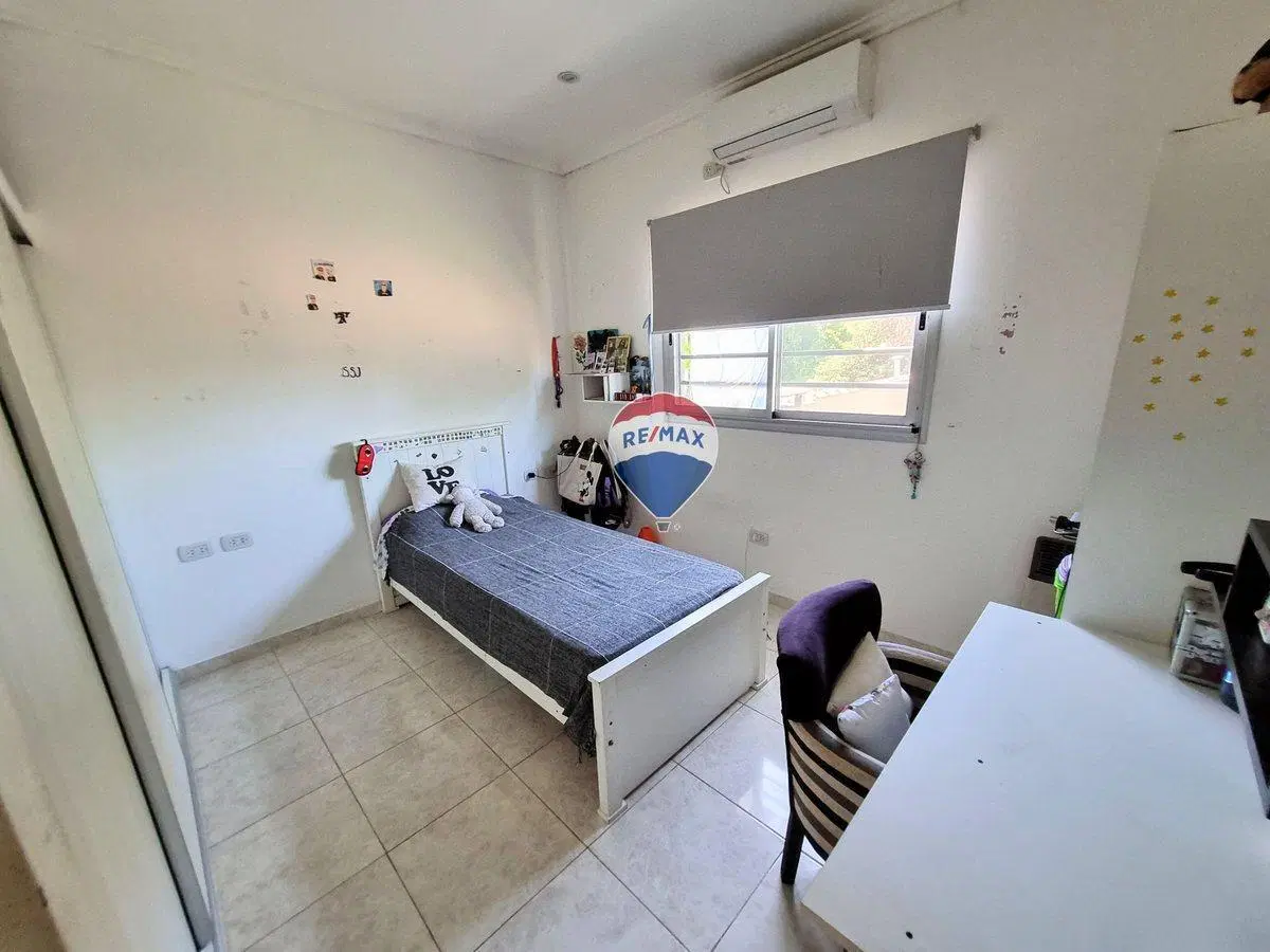 CASA 5 AMBIENTES CIUDAD EVITA PERMUTA 2