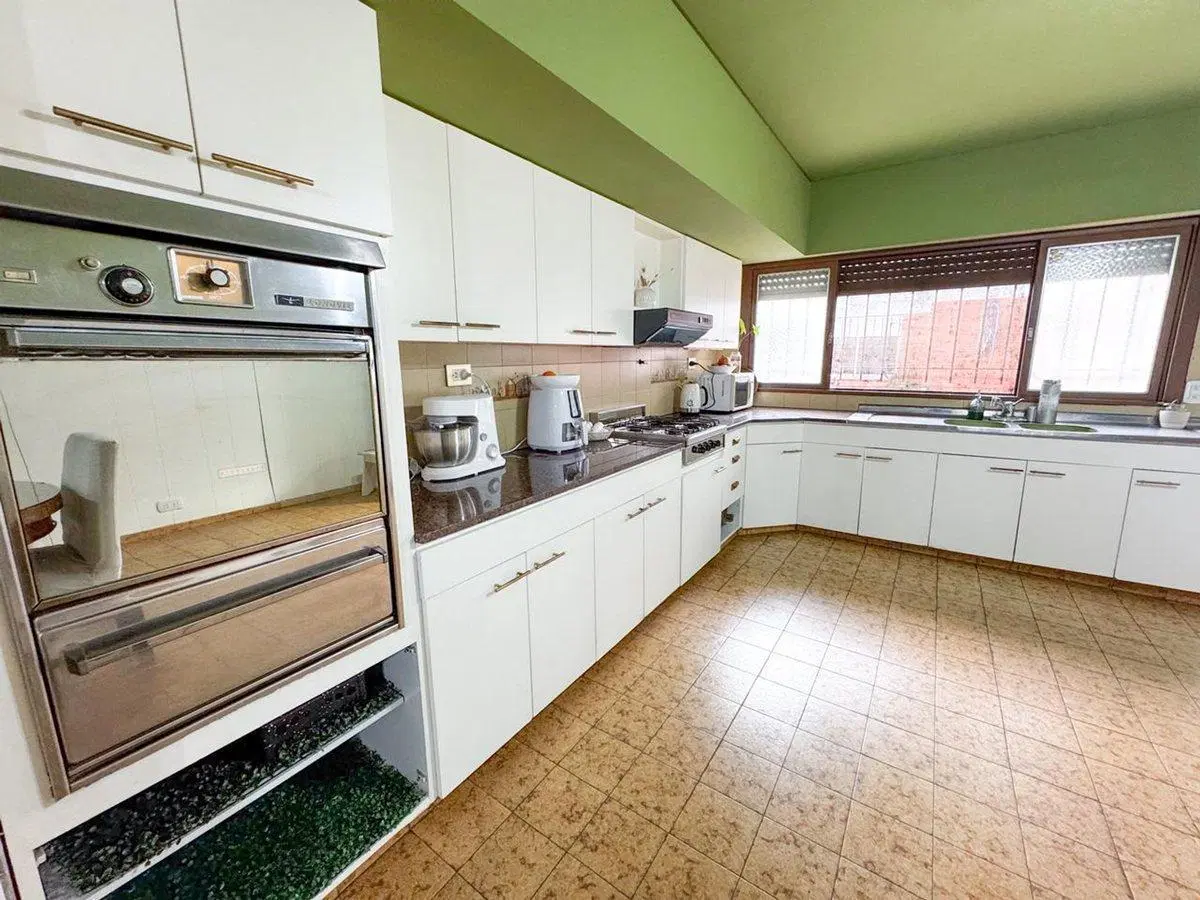 VENTA CASA 4 AMBIENTES + DEPTO LOMAS DEL MIRADOR 8