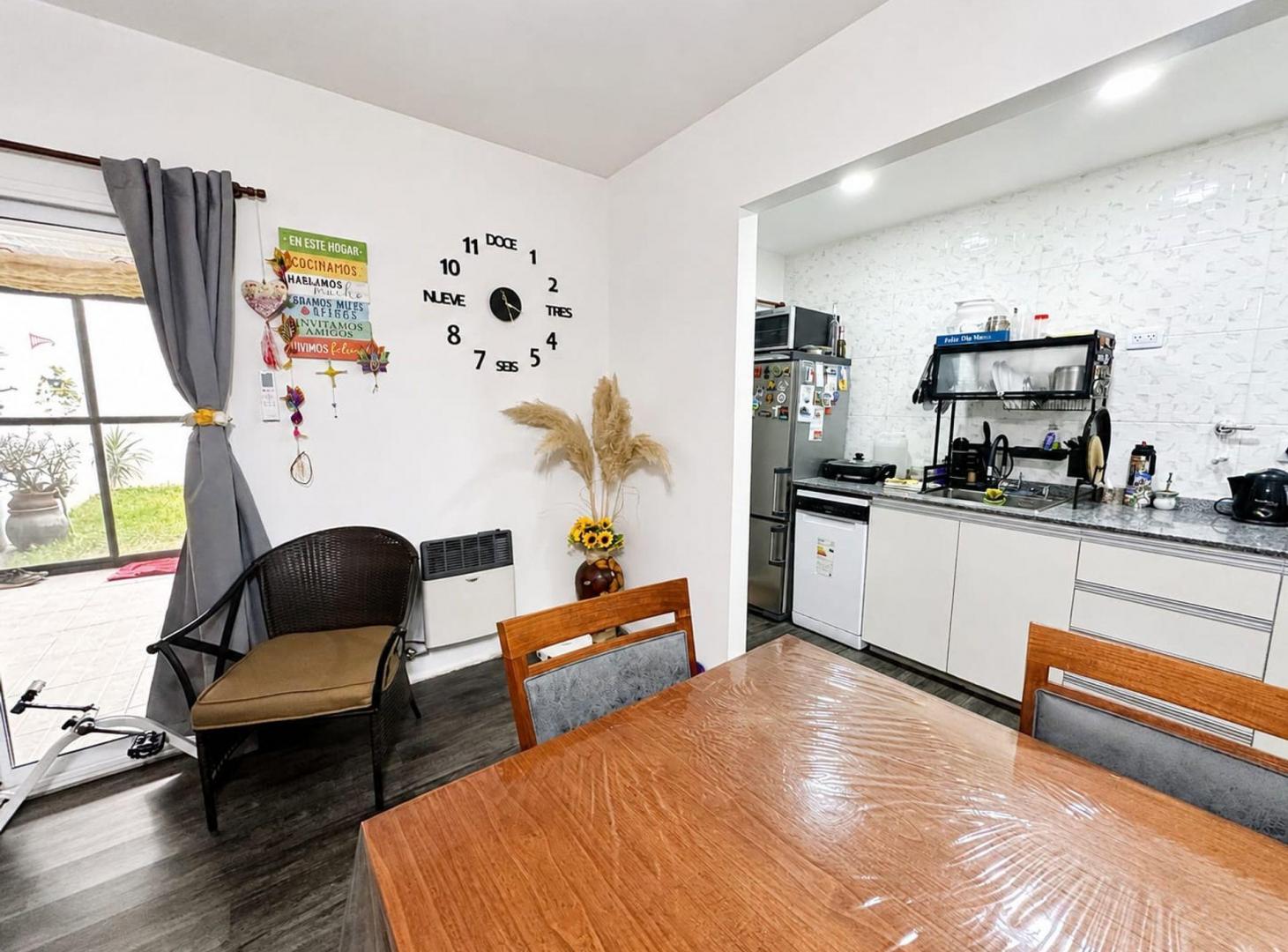 Foto de VENTA DEPARTAMENTO 2 AMBIENTES C/ COCHERA Y JARDIN, imagen 2