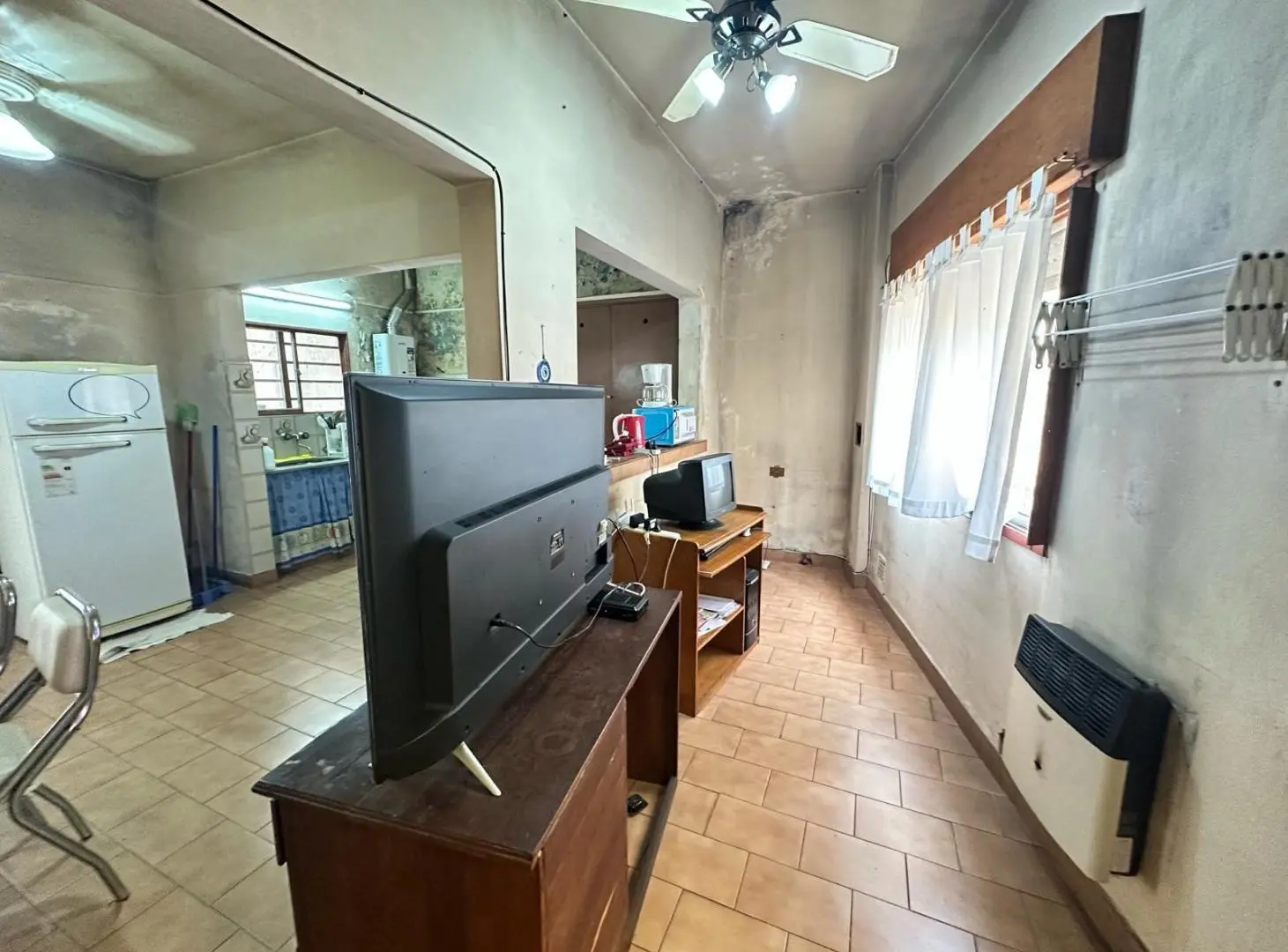 VENTA: Departamento de pasillo con dos dormitorios a reciclar, Rosario 3