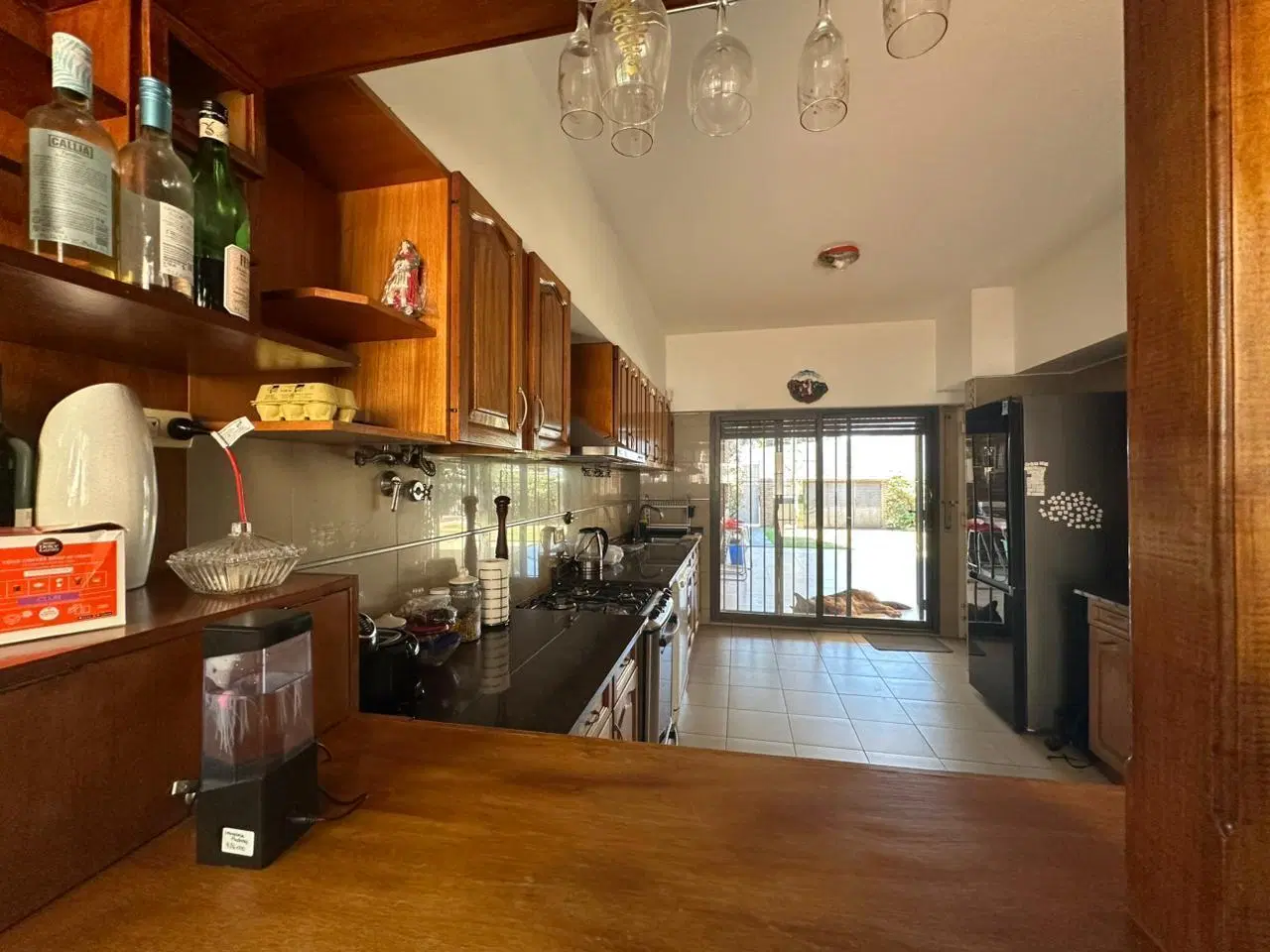 VENTA: Casa de 5 dormitorios, estudio de sonido en subsuelo, pileta y vista parcial al río. Alberdi. 5