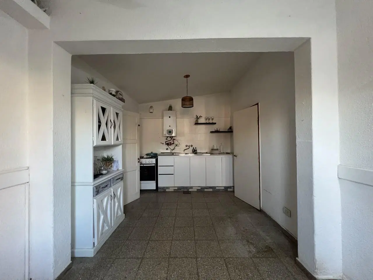 Venta - Casa de tres dormitorios con patio en Parque Field, Rosario 5