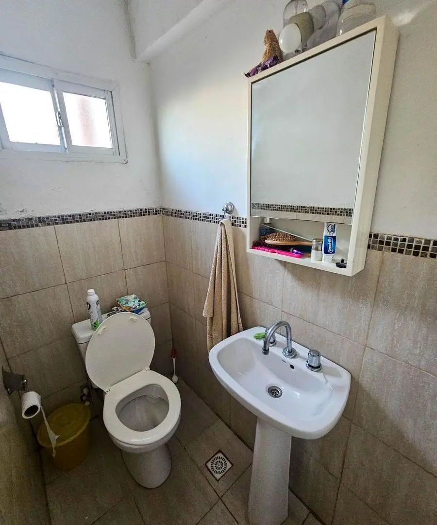 VENTA. Casa de tres dormitorios y piscina en Funes Town. Apto crédito. 8