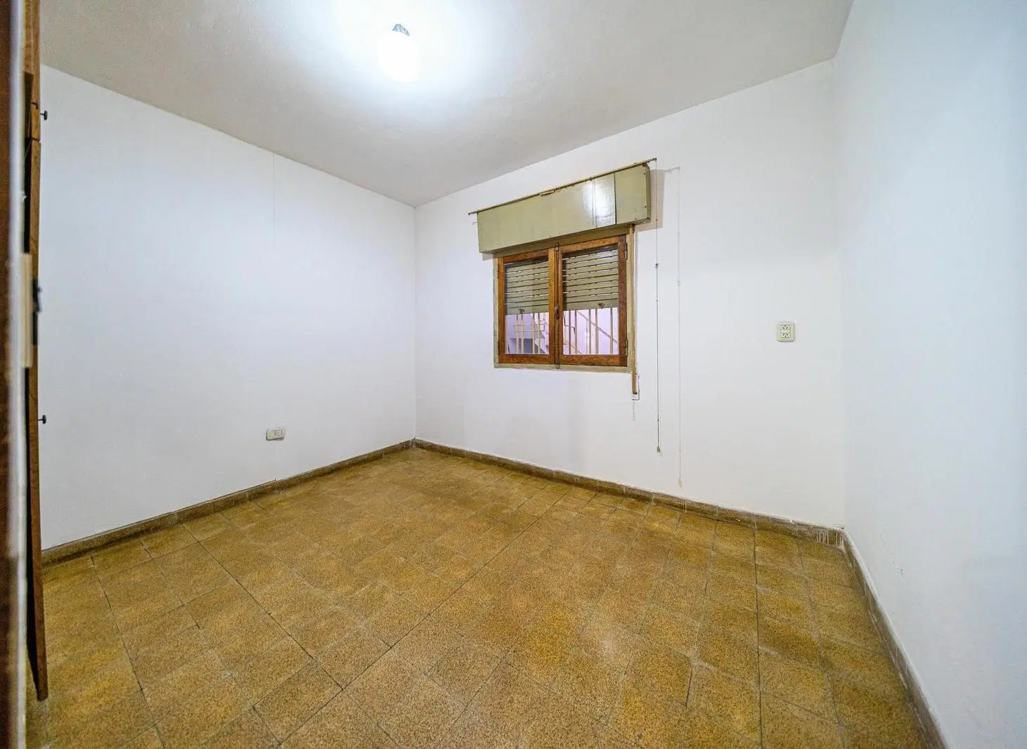 Venta casa de 2 dormitorios con cochera y patio, Lisandro de la Torre, Rosario 5