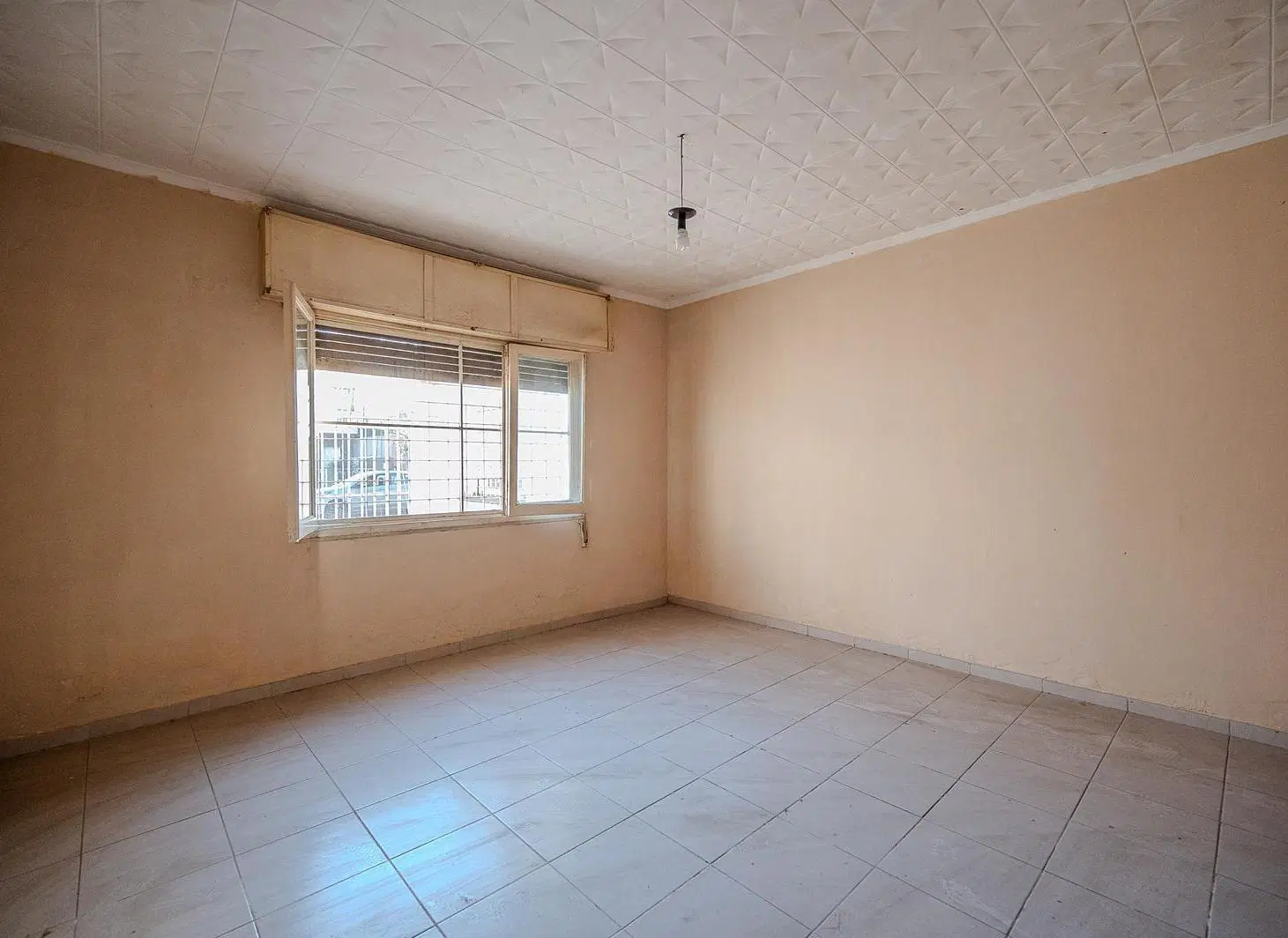 Venta casa de 2 dormitorios, doble cochera y jardín barrio Las Heras, Rosario 3