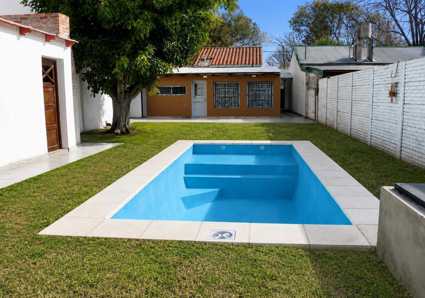 Foto de CASA DE 2 DORMITORIOS CON PISCINA Y POTENCIAL COMERCIAL, imagen 1