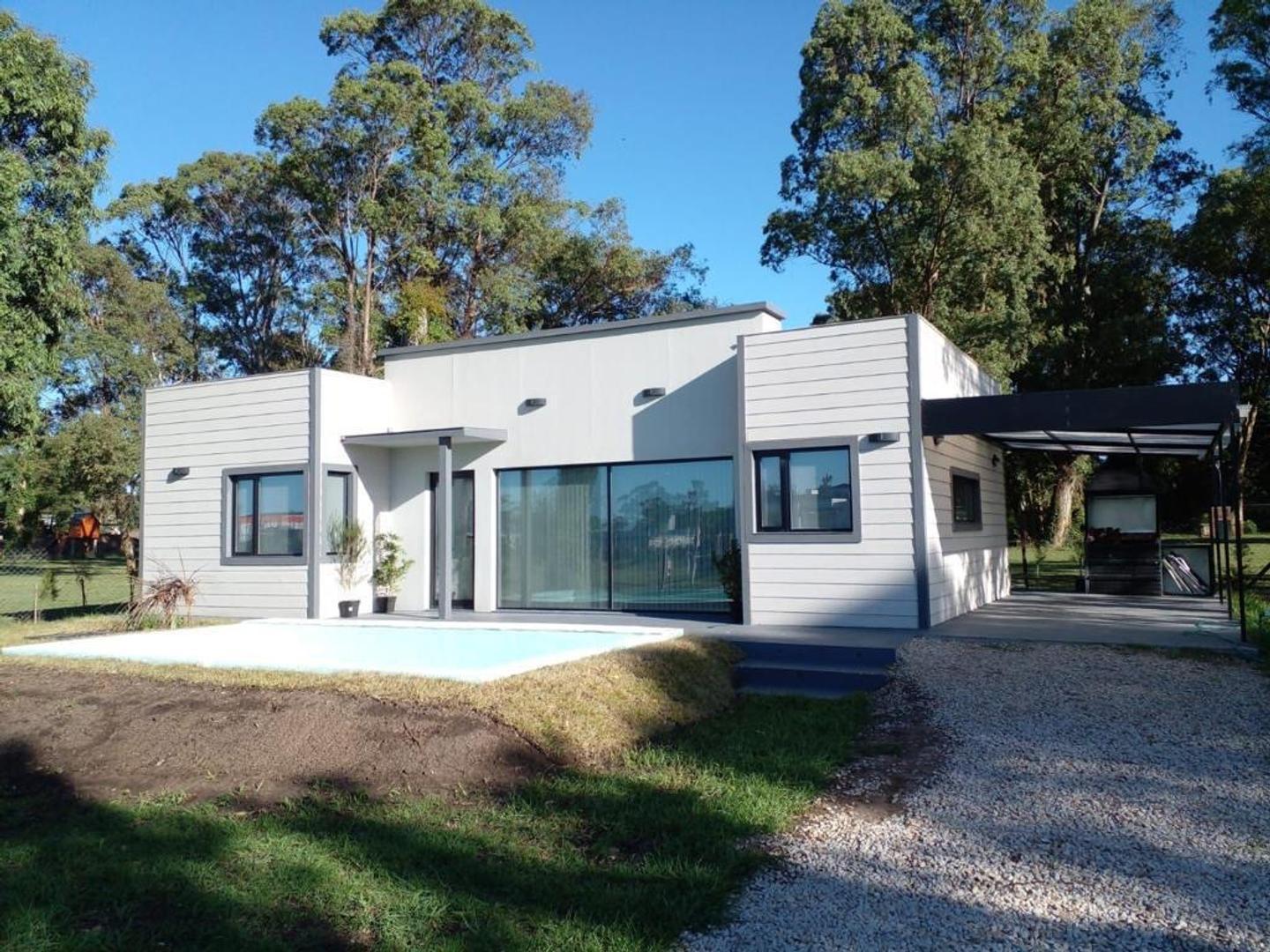 Foto de CASA CON PILETA Y GRAN PARQUE EN BARRIO CERRADO LA AURELIA, imagen 1