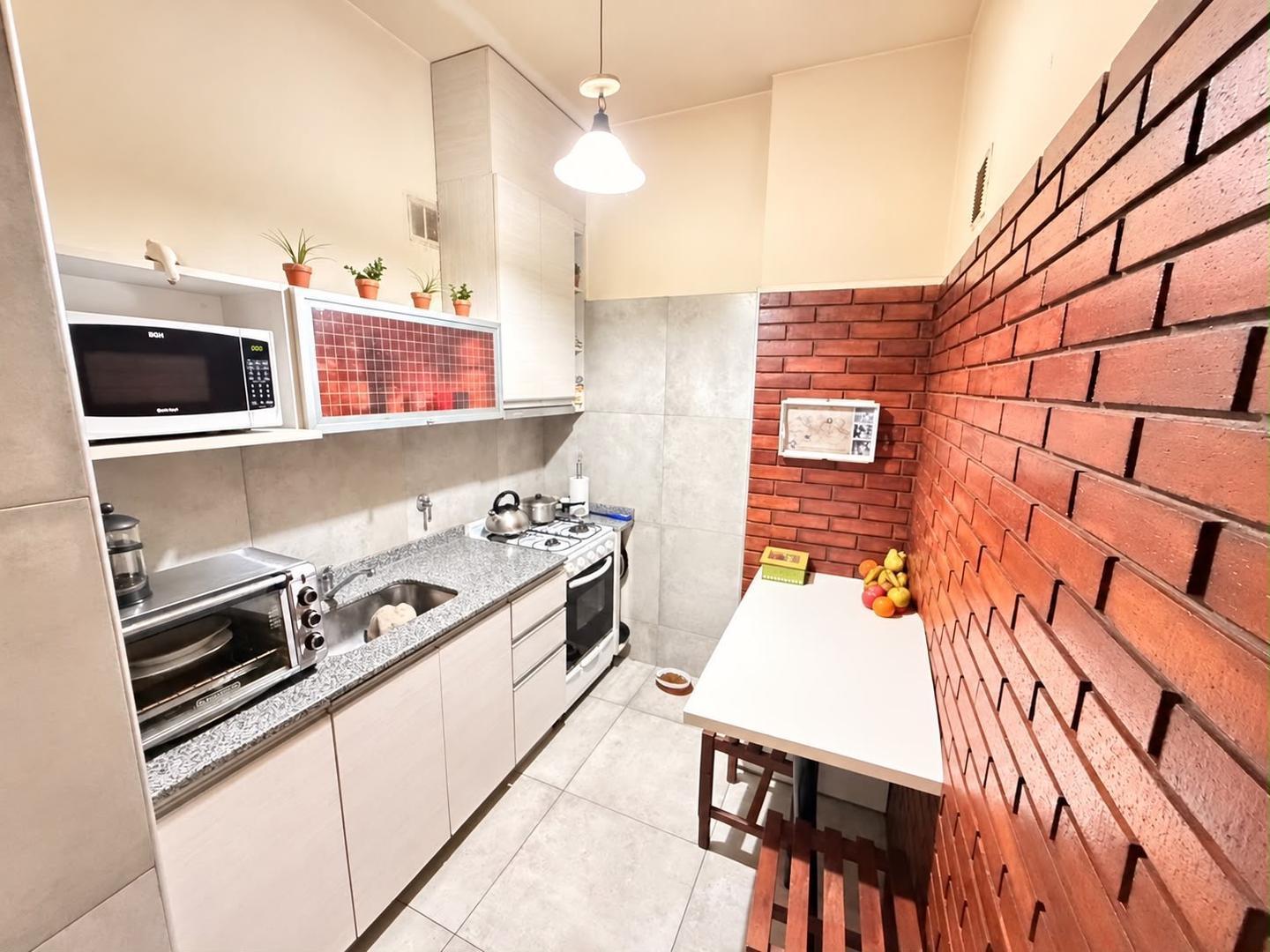 Foto de Departamento 3 ambientes planta baja con patio en Güemes, imagen 1