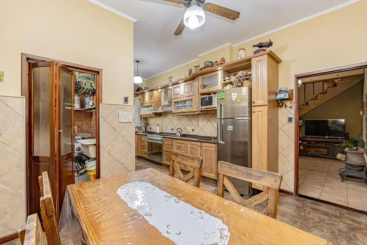 CASA LOTE PROPIO 5 AMBIENTES - JARDIN Y COCHERA 5