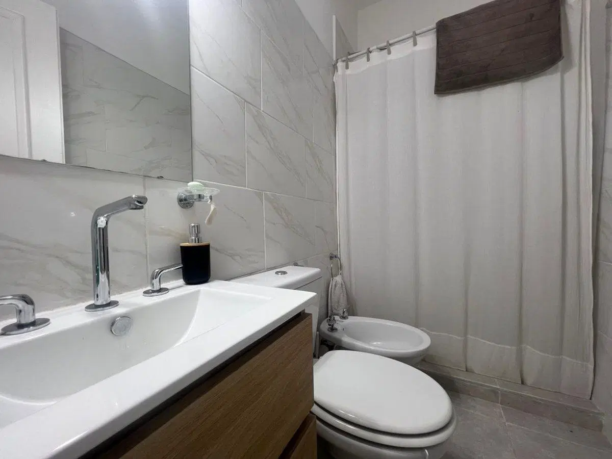 VENTA DEPARTAMENTO 2 AMBIENTES CON PATIO COCHERA 5