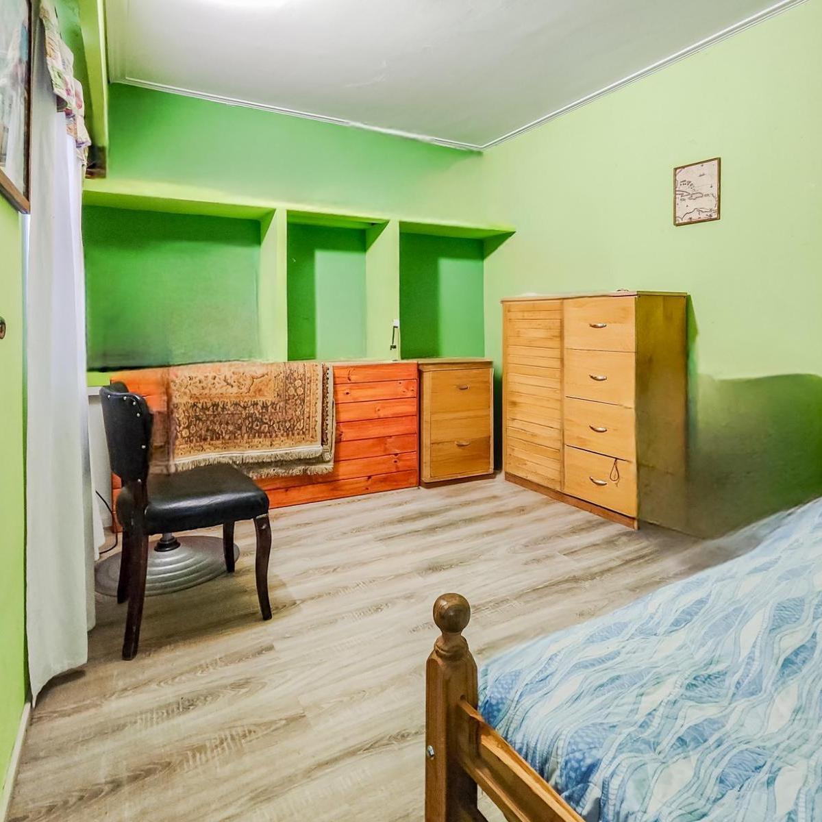 Foto de VENTA/PERMUTA - Casa de pasillo 4 dormitorios. Barrio Matheu, Rosario., imagen 4