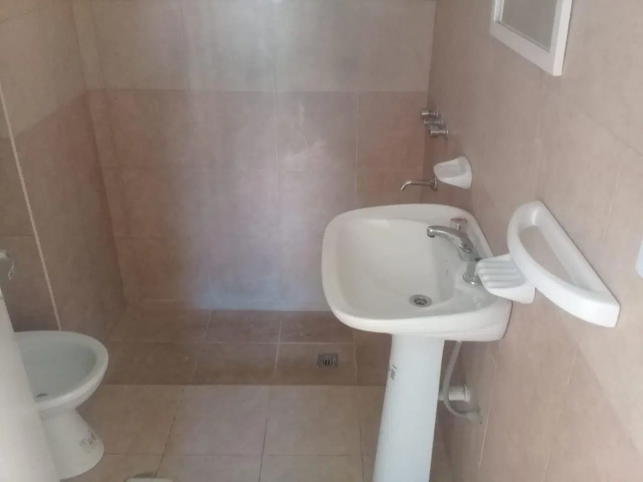 Departamento en complejo cerrado, con cochera y asador 4