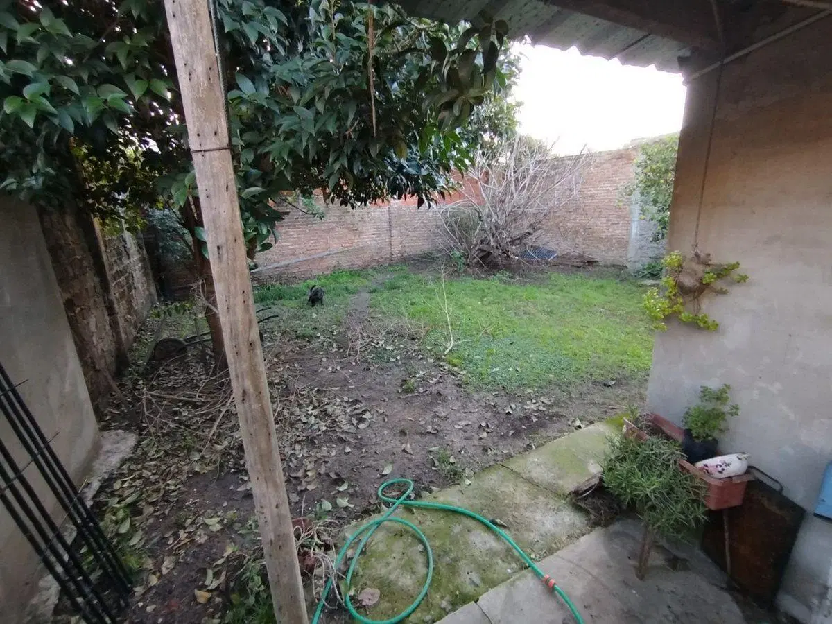 CASA en VENTA CON LOCAL COMERCIAL / LOTE de 254 MT 8