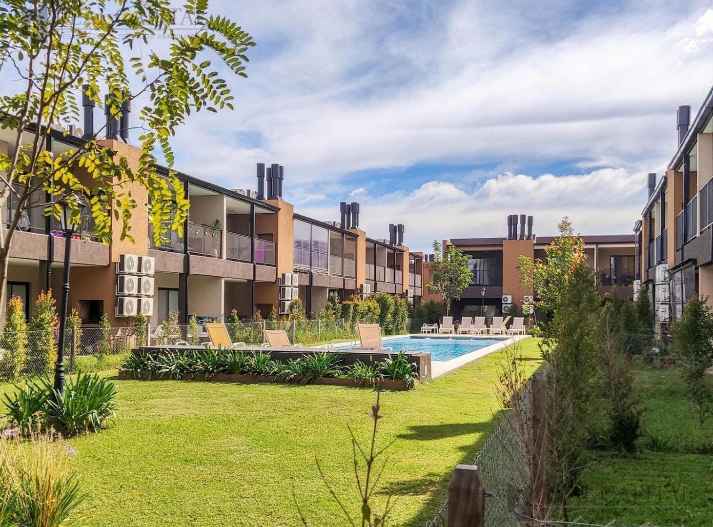 Foto de Monoambiente con galería, parrilla y jardín privado. Una propuesta, imagen 1