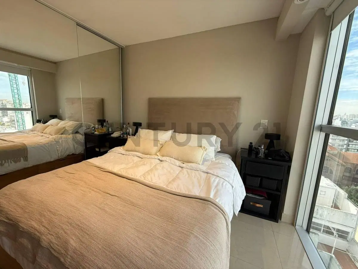 VENTA DEPARTAMENTO DE 2 AMBIENTES CON COCHERA FRENTE AL PARQUE CENTENARIO 4